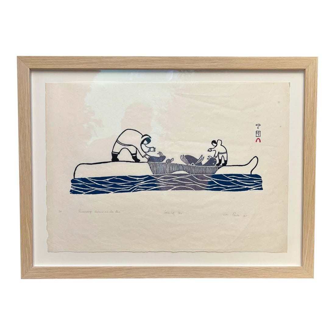 Inuit Stone Engraving by Pitseolak Ashoona "Butchering Walrus on the Floe" 1967 Cape Dorset - Limite: A striking 1967 stonecut engraving by legendary Inuit artist Pitseolak Ashoona (1904-1983), depicting traditional walrus butchering on the ice floe in bold black lines and rich navy blue. DETAILS: "&#