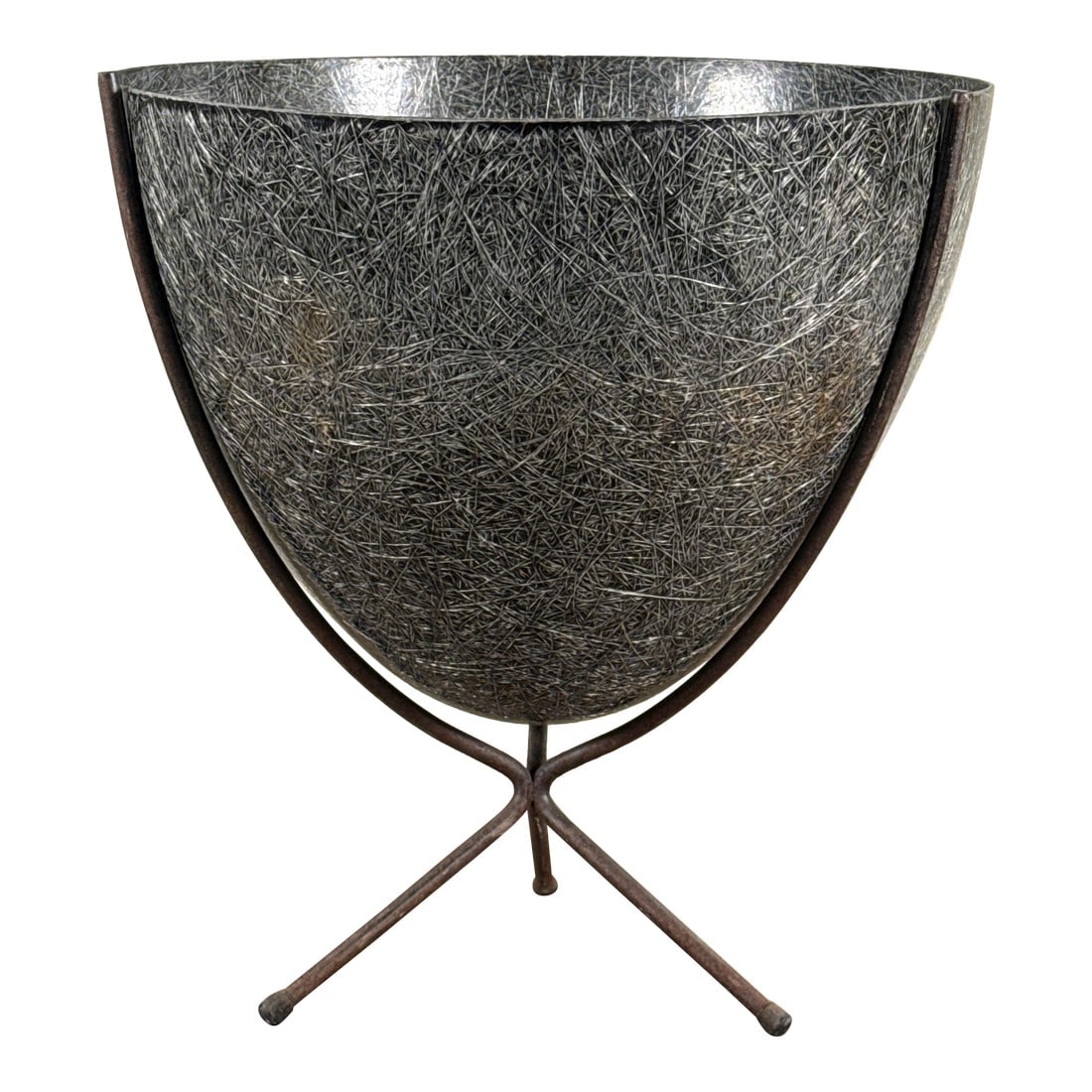Mid Century Modern Kimball Fiberglass and Iron Bullet Planter on Tripod Stand: This mid century planter by Kimball, features a sculptural iron tripod base supporting a dark gray textured fiberglass bowl, creating a striking modernist form suitable for use as a planter or decorat