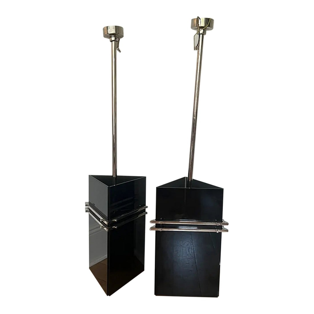 1920s Hungarian Art Deco Smoked Glass Pendant Lights - a Pair: Pair of 1920s Hungarian Art Deco pendant lights in triangular smoked glass with nickel plated chrome fittings. Reclaimed from a Budapest movie theater, they combine geometric design with atmospheric l