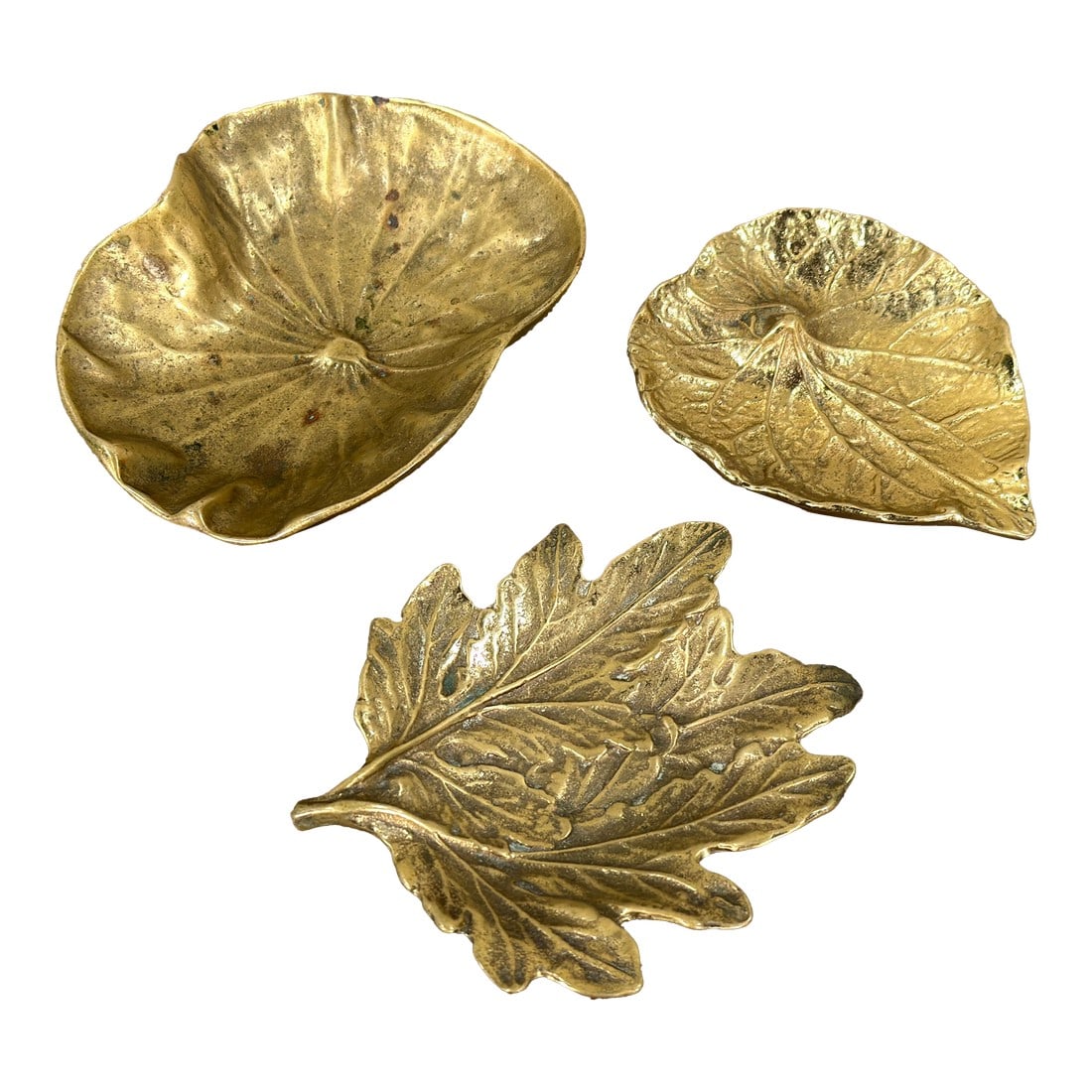 Virginia Metalcrafters Solid Brass Leaf Catchalls, Lotus, Violet & Chrysanthemum - Set of 3: These three cast brass leaf-form catchalls by Virginia Metalcrafters each capture a different botanical subject with excellent detail. The set includes a lotus leaf, a violet leaf, and a