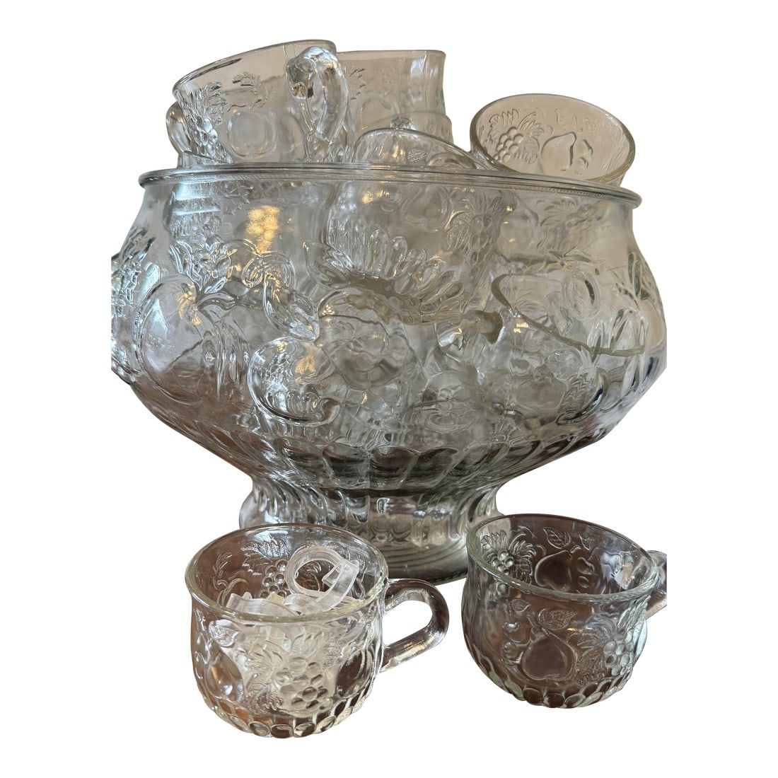 Mid 20th Century Jeanette Glass Fruit Pattern Punch Bowl Set - 34pcs: This is a set of a punch bowl, 24 cups, and nine hooks that would be an elegant touch to your event or gathering this year. This beautiful set can be used anytime for your special events, bringing a
