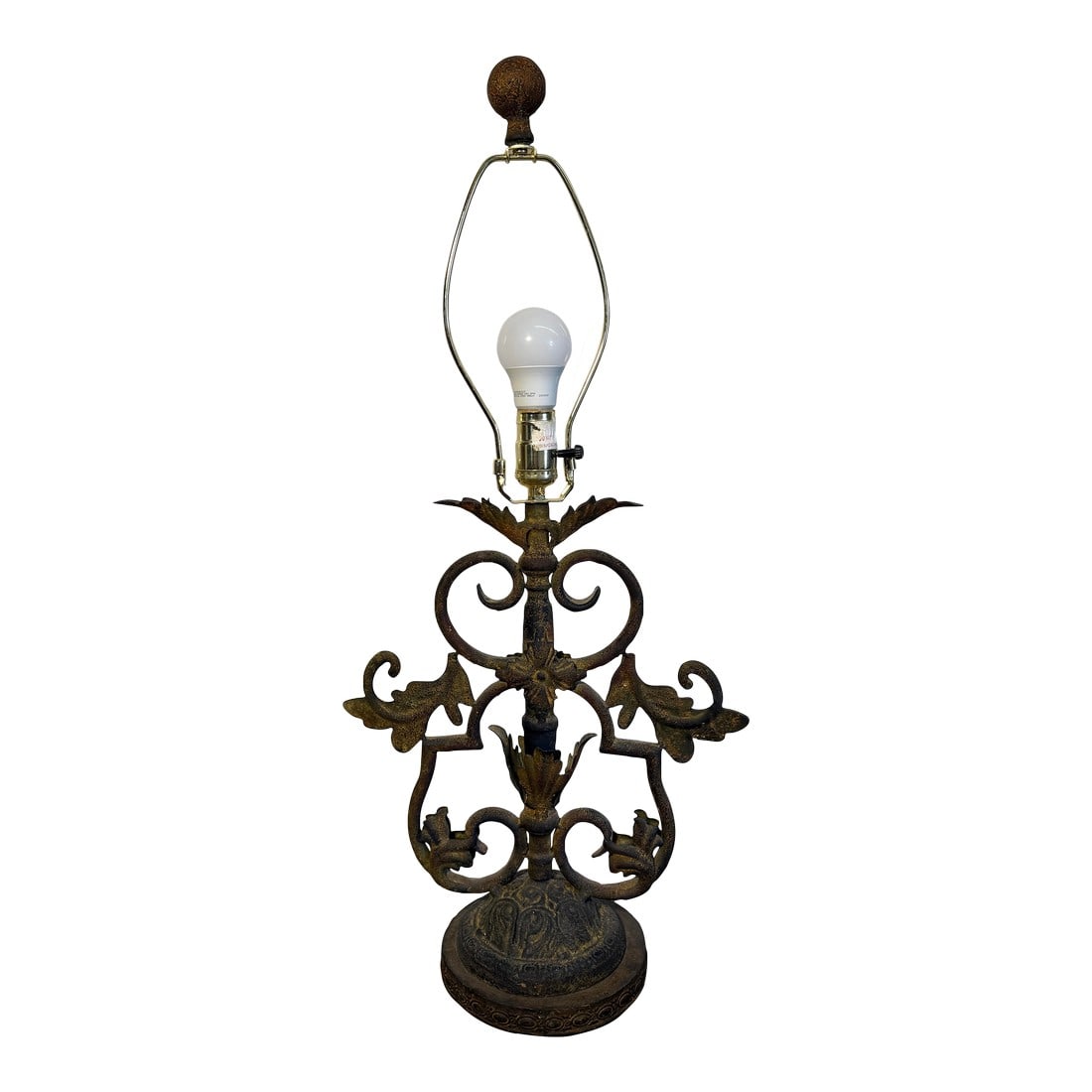 Forged Iron Table Lamp in Antique Finish: Iron work table lamp in antique iron finish. 41" to top of finial. 13" wide. Condition: Alterations: Original Condition Unaltered Imperfections: Some Imperfections Condition Notes: In great