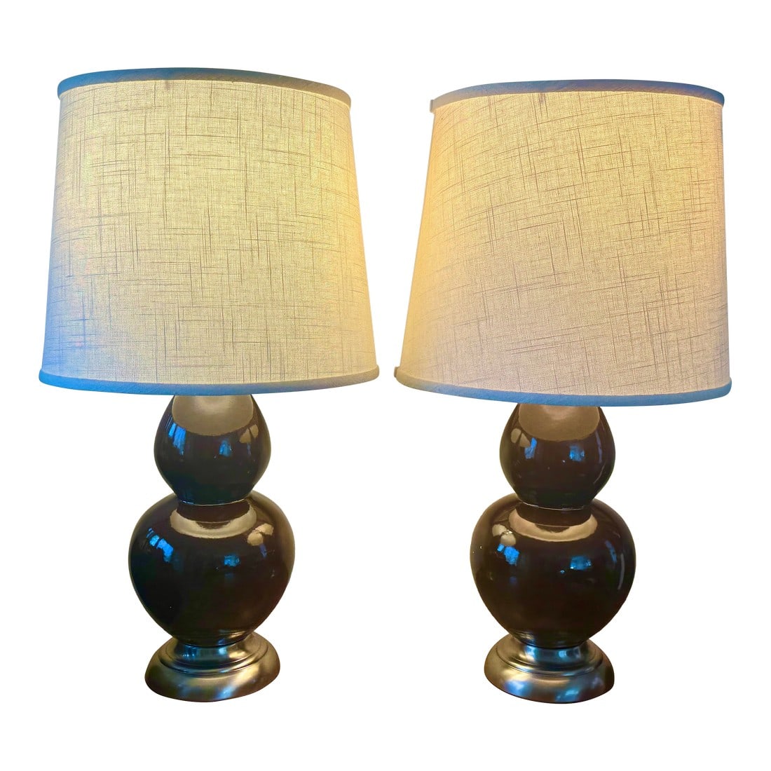 Contemporary Gourd Table Lamps - a Pair: Pair of chocolate brown Robert Abbey double gourd lamps with ivory linen shades and brushed chrome base and finial. Condition: Alterations: Original Condition Unaltered Imperfections: Some Imperfectio