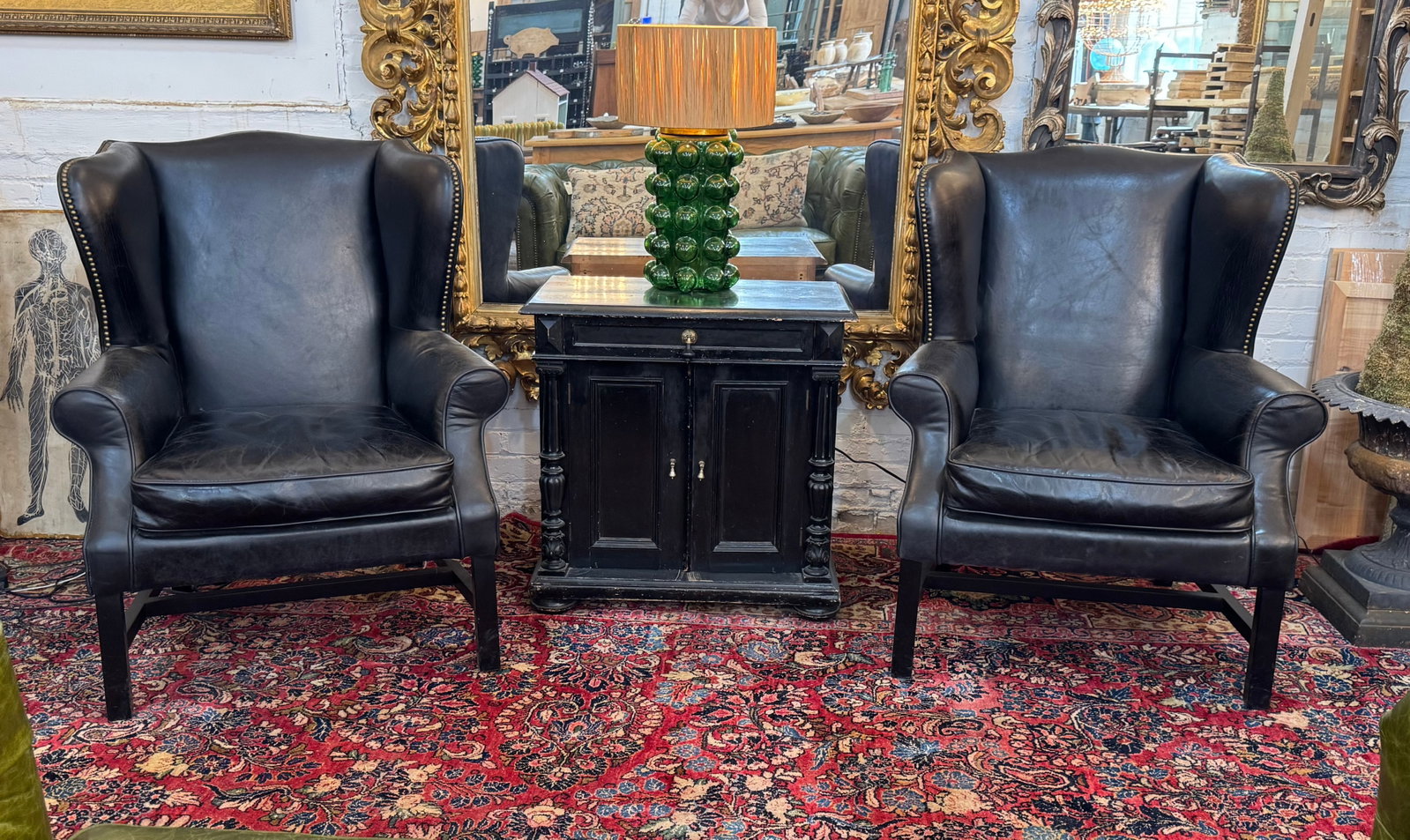 Pair of Vintage Black Leather Wingback Chairs With Brass Nailhead Trim - 2