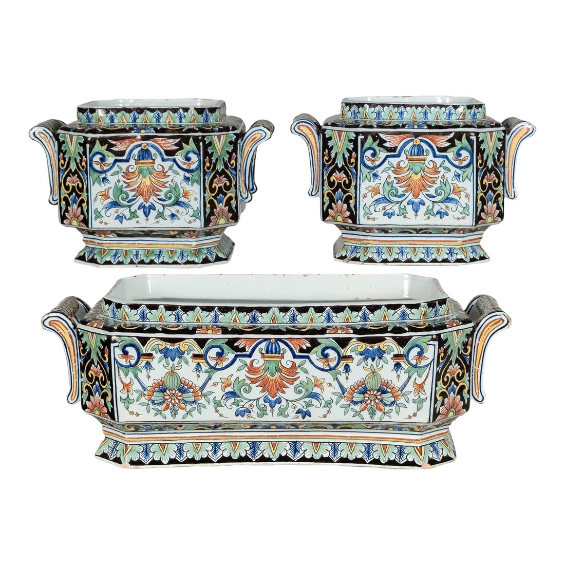 19th Century French Desvres Jardinière and Cachepot Set of 3: A set of three 19th century French polychrome painted faience planters, including a rectangular jardinière, and two square cachepots from Desvres by Fourmaintraux Freres. Hand painted in typical