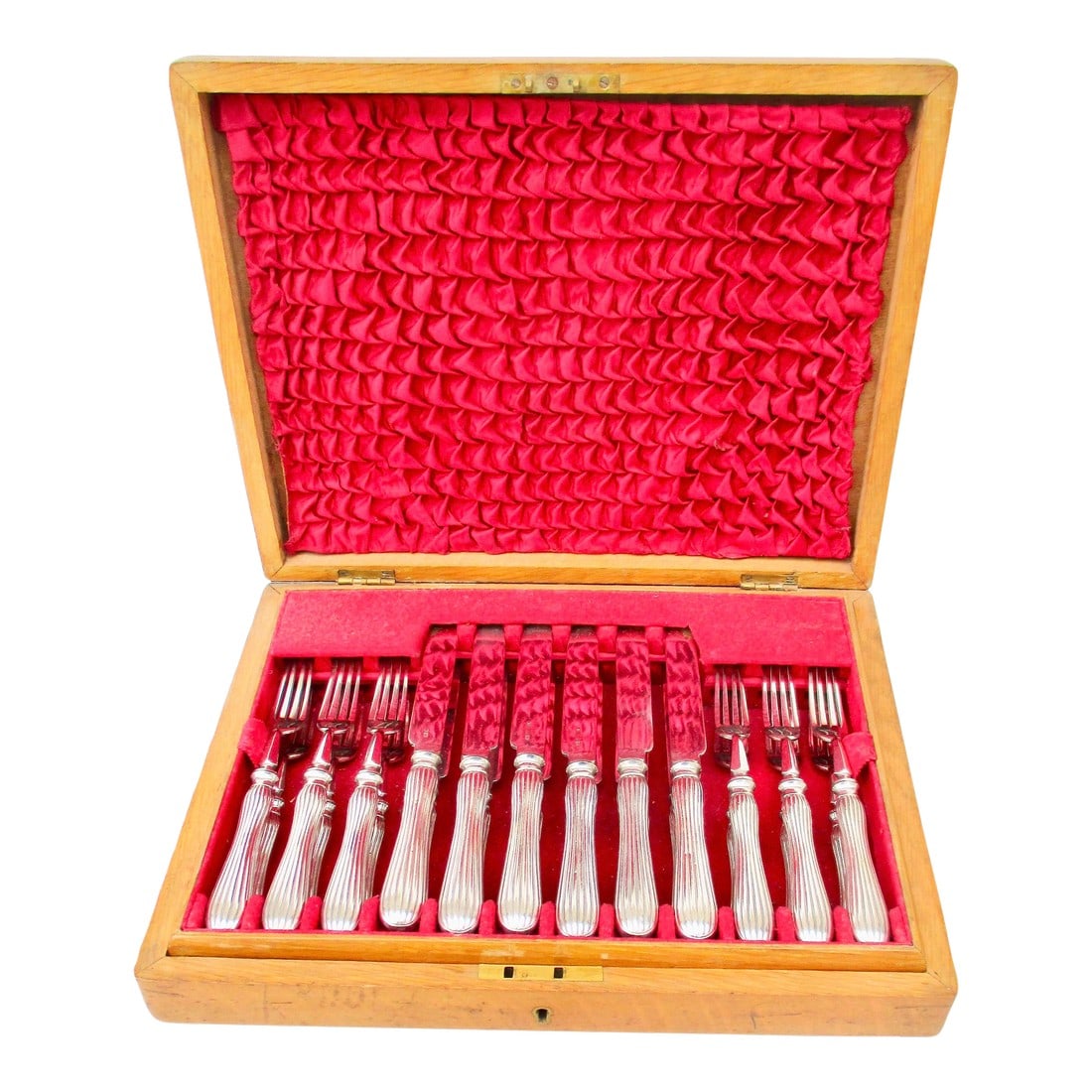 1900s Dixon Fruit Set in Original Case Circa 1900 - 24 Pieces: Dixon fruit set in the case of Deco style. The wooden case measures 13.5" by 10.25" deep. Packed in two layers and resting on a red velvet lining. 12 knives and 12 forks. The knife measures 8.5" and
