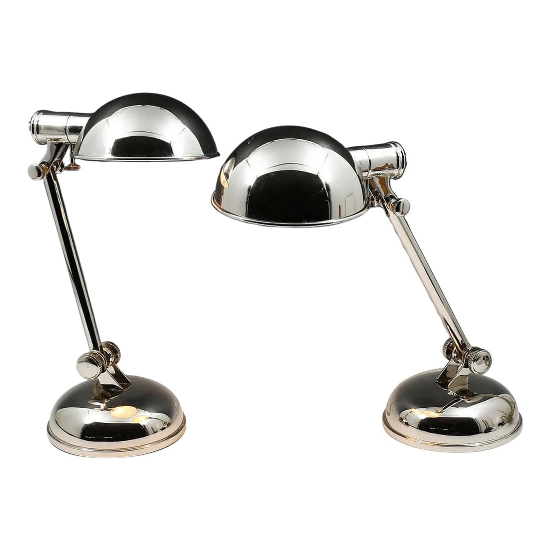 Late 20th Century Ralph Lauren Home Polished Chrome Articulated Desk Lamps - a Pair: A striking pair of polished chrome articulated desk lamps by Ralph Lauren Home, embodying the brand's signature blend of industrial function and refined luxury. Featuring adjustable swing arms and