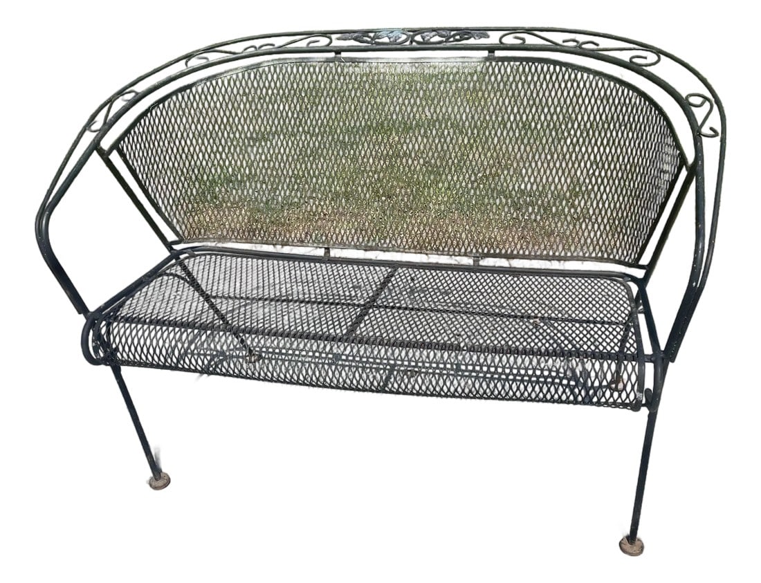 Mid 20th Century Woodard Grapevine Barrel Back Wrought Iron Bench Loveseat Grape Pattern: This is a fantastic looking, hard to find model and very comfortable wrought iron loveseat with a diamond mesh barrel shaped back and seat and the sweet cast grape and vine design on the back edge mad