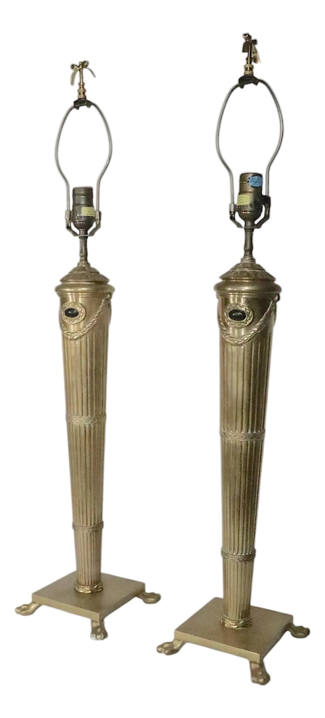 Late 20th Century Neo Classical Brass Table Lamps by Chapman - a Pair: Beautiful pair of Neo Classical brass table lamps, by Chapman circa 1997. The lamps feature elegant tapering fluted columns, with a foliate swag and jeweled motif. Both lamps are in very fine, origina