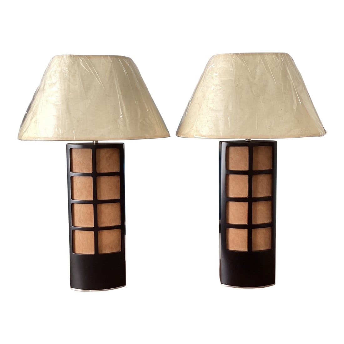 Late 20th Century Asian-Inspired Espresso-Stained Wood & Parchment Grid Table Lamps With New Shades: Striking pair of Asian-inspired table lamps crafted in espresso-stained wood, featuring a sculptural lantern form with inset grid panels of warm parchment. The rich, dark finish contrasts beautifully 