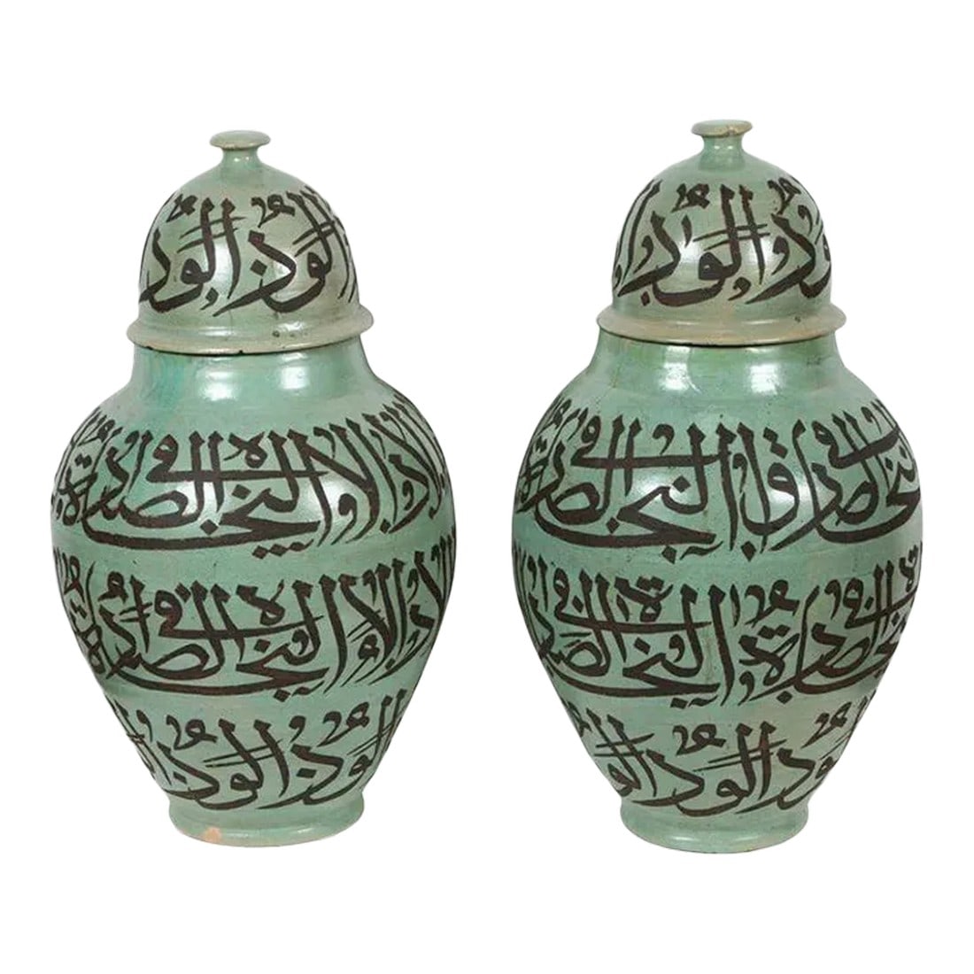 Moorish Green Ceramic Urns With Chiseled Arabic Calligraphy Writing - a Pair: Large green Moorish ceramic Urns chiseled with Arabic calligraphy poetry writing. Handcrafted vases from Fez Morocco etched with Arabic calligraphy. This kind of Art Writing looks calligraphic is call