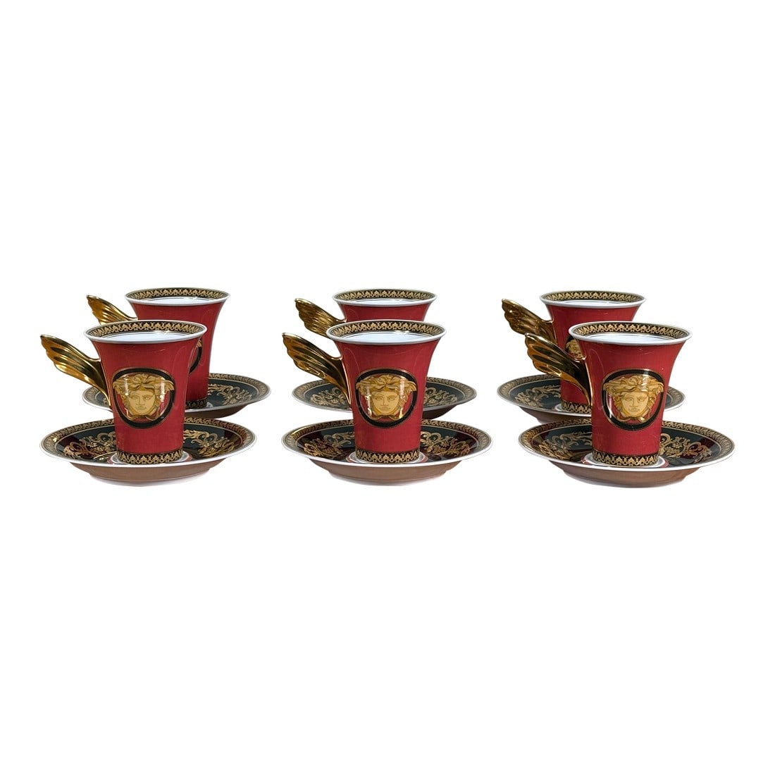 Baroque Versace Medusa Red Espresso Cups and Saucers - Set of 6: A dramatic and luxurious set of six espresso cups and saucers from the Rosenthal x Versace collaboration, featuring the iconic Medusa head in rich gold on vibrant red porcelain. Designed in the classi