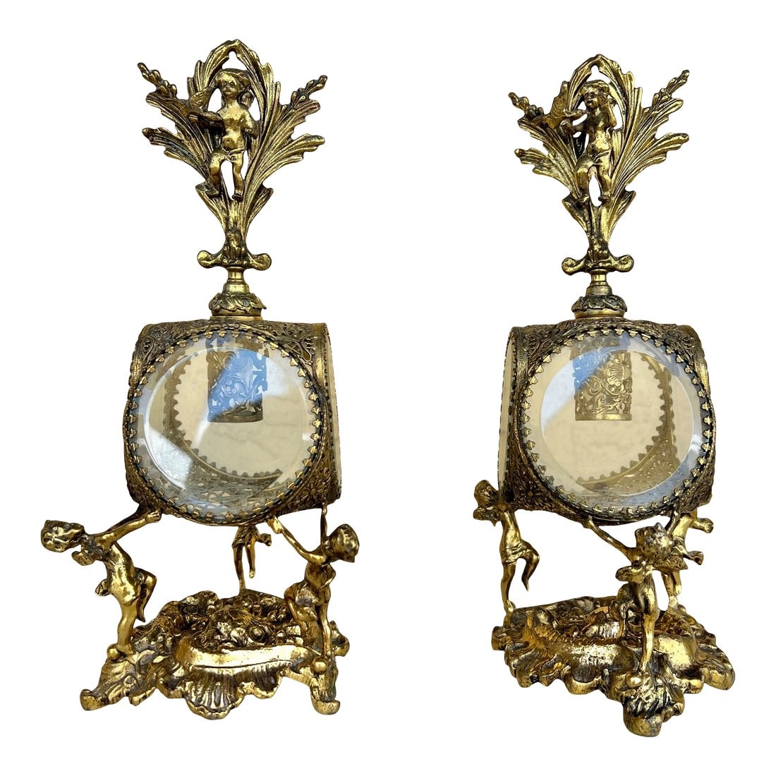 Antique Figaro Metal Glass, Perfume Bottles Pair: Pair of 2 ormolu filag highly decorative, featuring prominent cherub (putti/angel) figures and elaborate Rococo Revival motifs, including scrollwork and roses on the base. A cherub figure sits atop