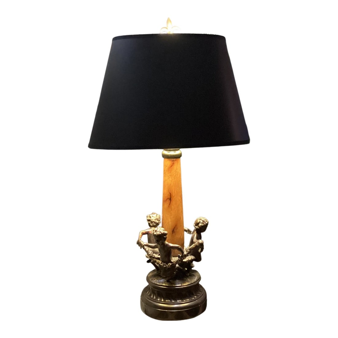 Late 20th Century Sarreid Ltd. Cherub Bronze Table Lamp With Parchment Shade: Elegant Sarreid Ltd. table lamp featuring a sculptural base of three classical cherubs in a dark bronze-tone metal, beautifully encircling a warm, crackle-finish column. This statement piece balances 