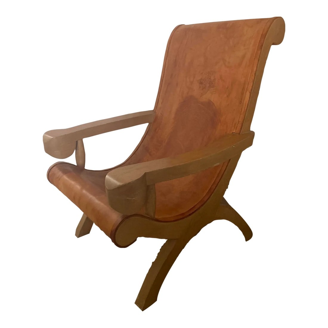 1940s Clara Porset Butaque Leather and Wood Chair: Original patinated "Butaque" leather and cypress wood lounge chair, made in Mexico circa 1947. Attributed to Clara Porset. Marked "Made in Mexico". Strong, elegant, patinated leather seat and back res