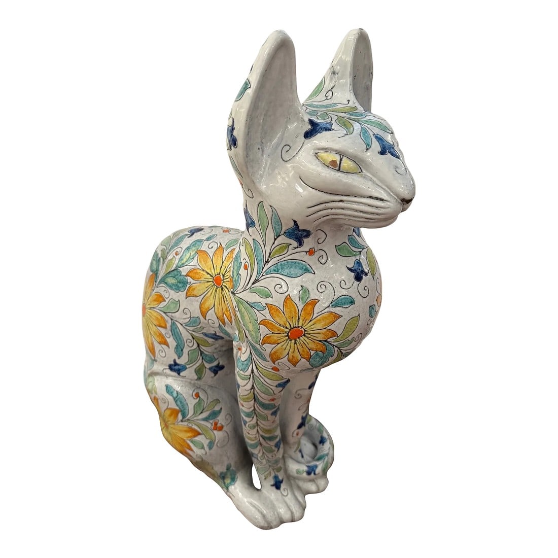 Egyptian Inspired Sgraffito Glazed Terracotta Cat With Floral Decoration: Large striking Italian Egyptian inspired terracotta statue of a beautifully glazed and decorated cat with floral designs with green, turquoise, yellow and orange against a white background. It dates t