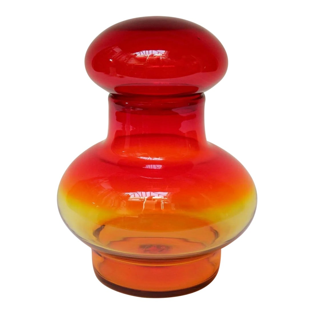 Large Vintage Glass Amberina Vase With Stopper by John Nickerson for Blenko: Large blown glass amberina/tangerine lidded jar designed by John Nickerson for Blenko (model number 7328). This model first appeared in the 1973 Blenko catalog and remained in production for only two 