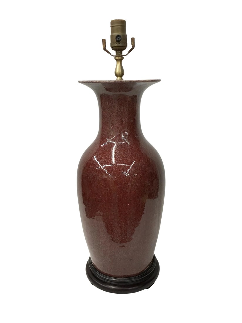 Vintage Oxblood Vase Lamp: Vintage oxblood vase lamp with aged cracks and chips on mouth. Condition: Alterations: Original Condition Unaltered Imperfections: Some Imperfections Condition Notes: Vintage with some imperfections