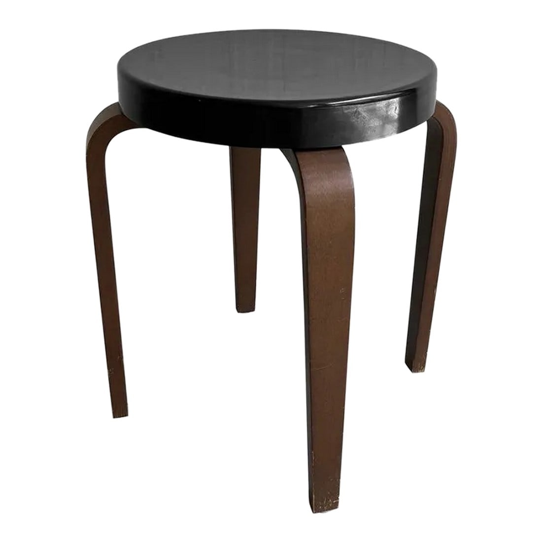 1950s Bentwood Bakelite Stacking Stool by Thonet: Classic, art deco, stackable stool by Thonet features bentwood legs with a black, 14 inch diameter, hard plastic, Bakelite top. Condition: Alterations: Original Condition Unaltered Imperfections: