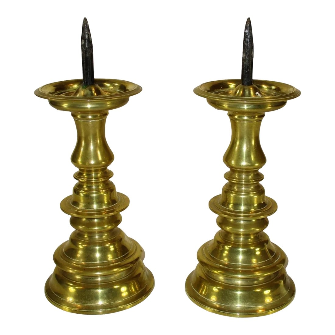 Late 20th Century Williamsburg Restoration Virginia Metalcrafters Brass Candlesticks - a Pair: Add a touch of elegance to your home with this stunning pair of brass candle holders by: Williamsburg Restoration. Standing at 9.3/4" inches tall, these candlesticks are perfect for all occasions and