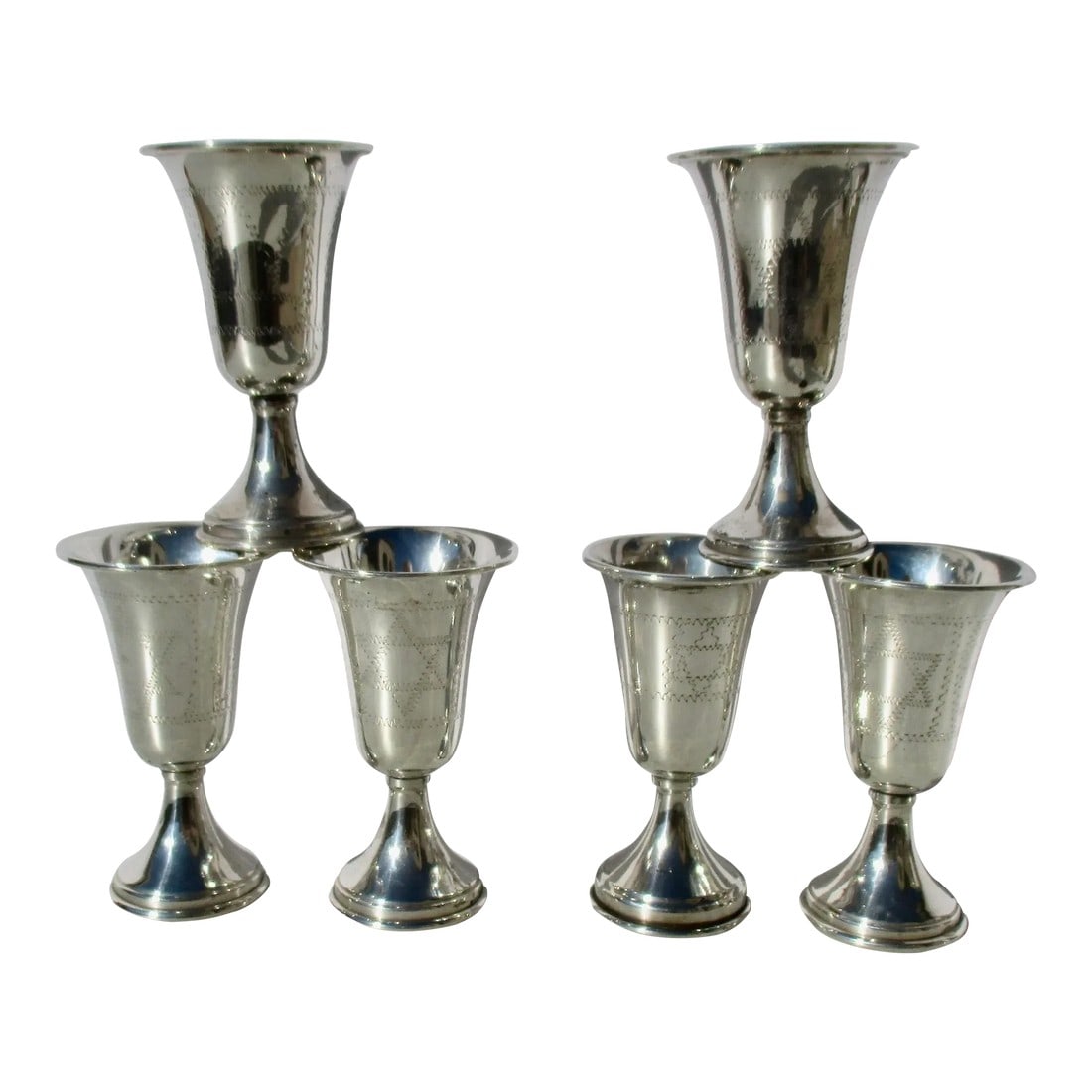 Vintage Kiddush Cups Sterling Silver -Set of 6: Set of 6 Kiddush cups marked sterling on the foot rim. The sides are engraved in handmade zigzag lines with a Star of David fronts. Vintage 60s European source.Very clean and smooth. The measurements