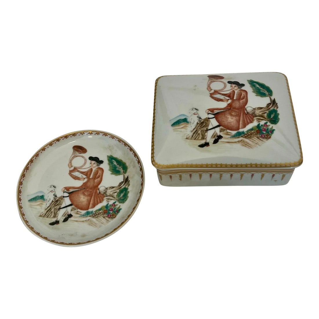 Vintage Mottahedeh Porcelain Alegre Lidded Cigarette Box & Ashtray - 2 Piece Set: Vintage Mottahedeh Historic Charleston Alegre porcelain cigarette box with lid and ashtray. Circa 1960.. Man playing a trumpet, sitting on a log with his dog at his knee depicted both on the box lid
