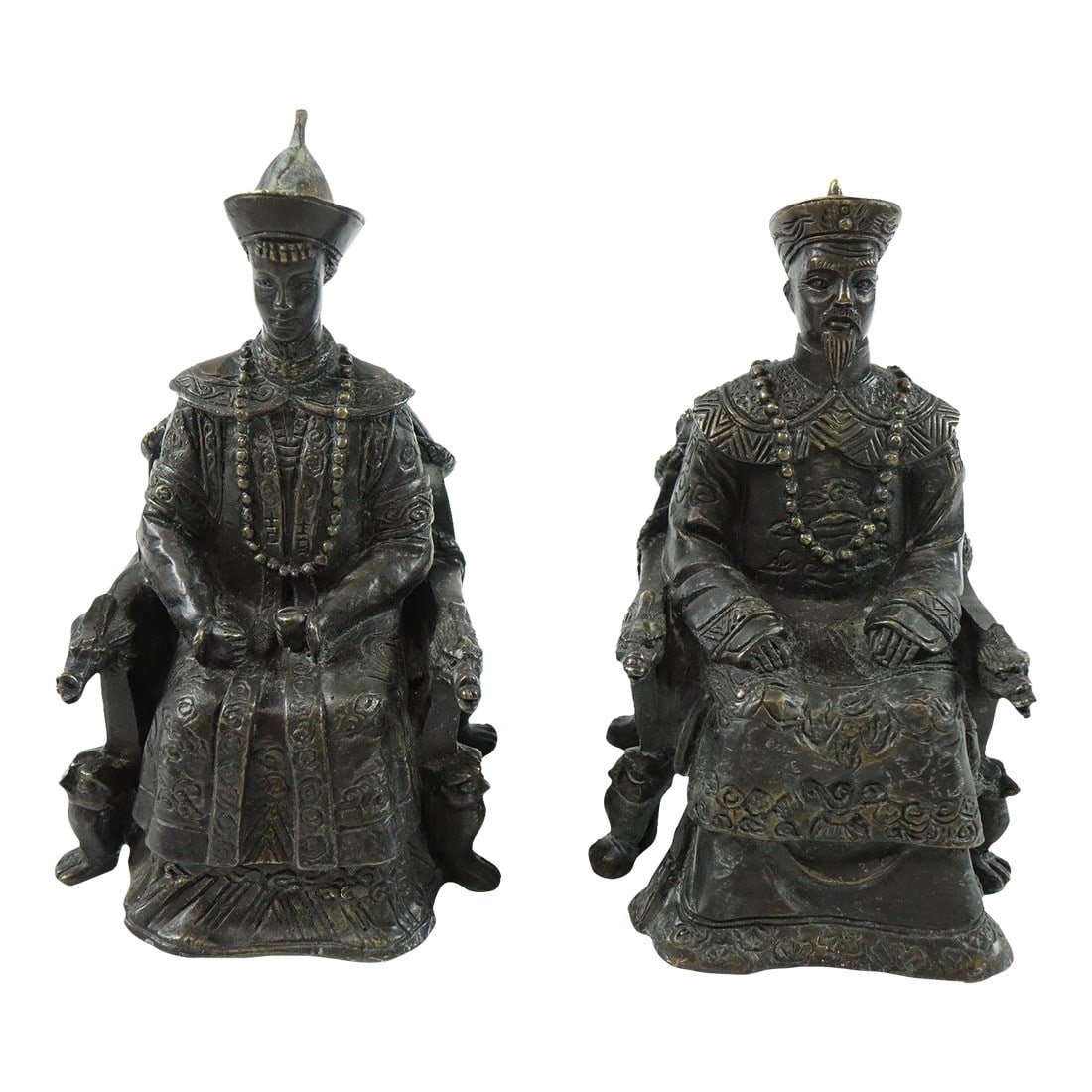 Pair of 19th Century Chinese Bronze Figures of Emperor and Empress: This stunning pair of Chinese bronze figures, dating back to the 19th century, offers a rare and timeless glimpse into the regal traditions of ancient China. Expertly crafted, the figures depict an im