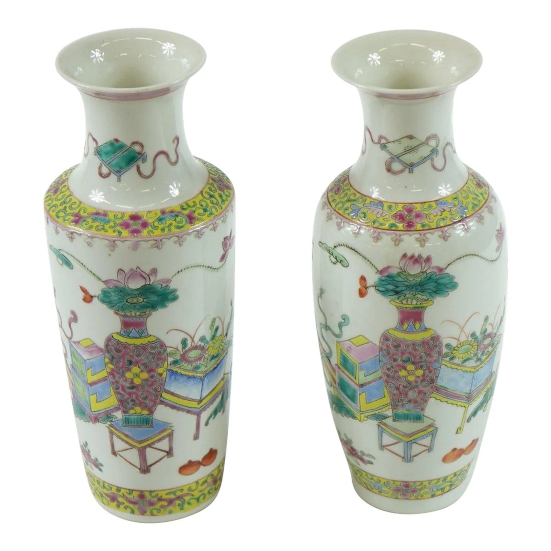 Early 20th Century Chinese Porcelain Vases - A Pair: This elegant pair of Early 20th Century Chinese porcelain vases embodies the exquisite craftsmanship of the period. Each vase features a harmonious blend of pastel hues, showcasing intricate designs