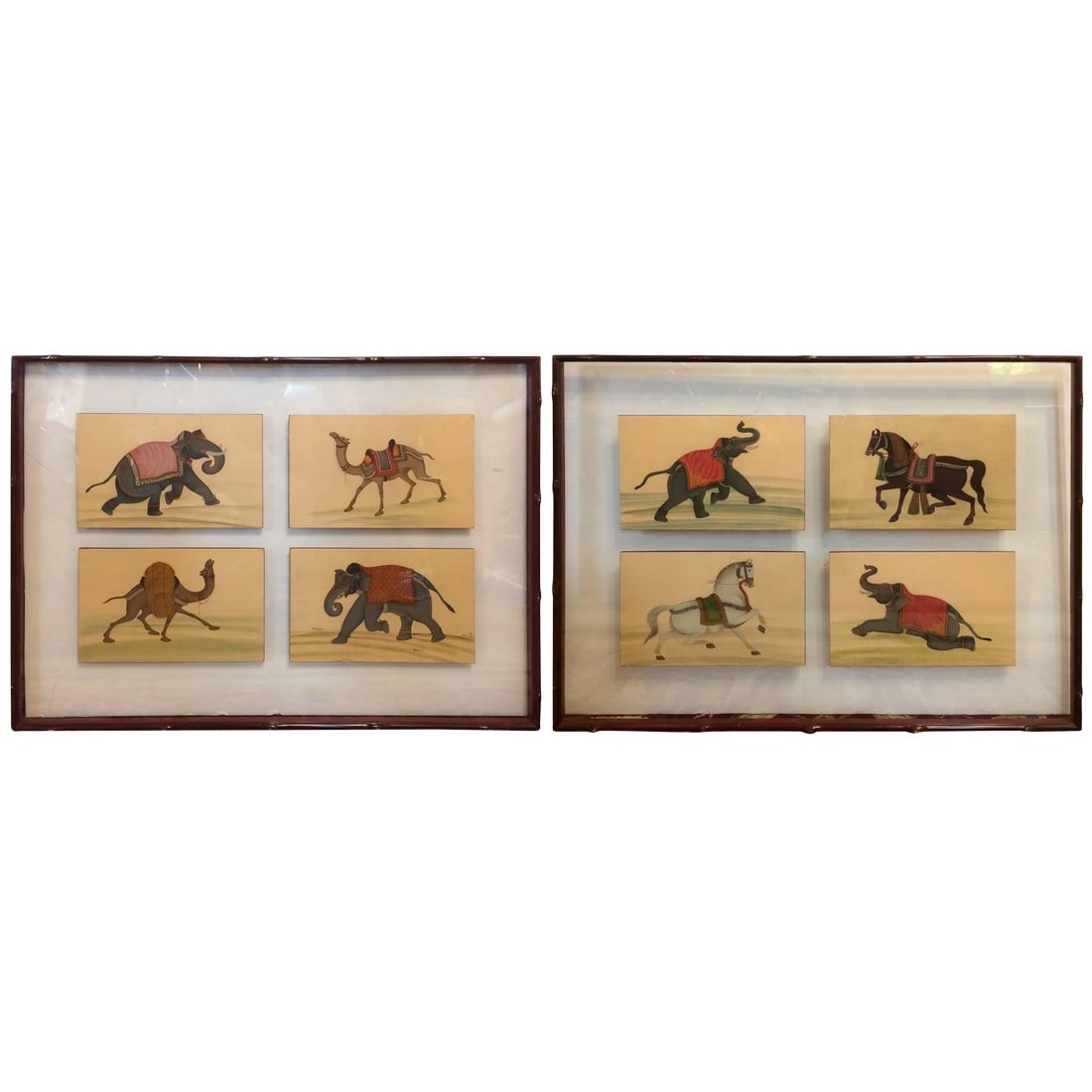 Fascinating Framed Hand-Painted Collection of Circus Animals - a Pair: A pair of framed small paintings cleverly mounted as collections of four between two pieces of transparent glass. This enables the wall, whether painted or wall papered, to show through as the