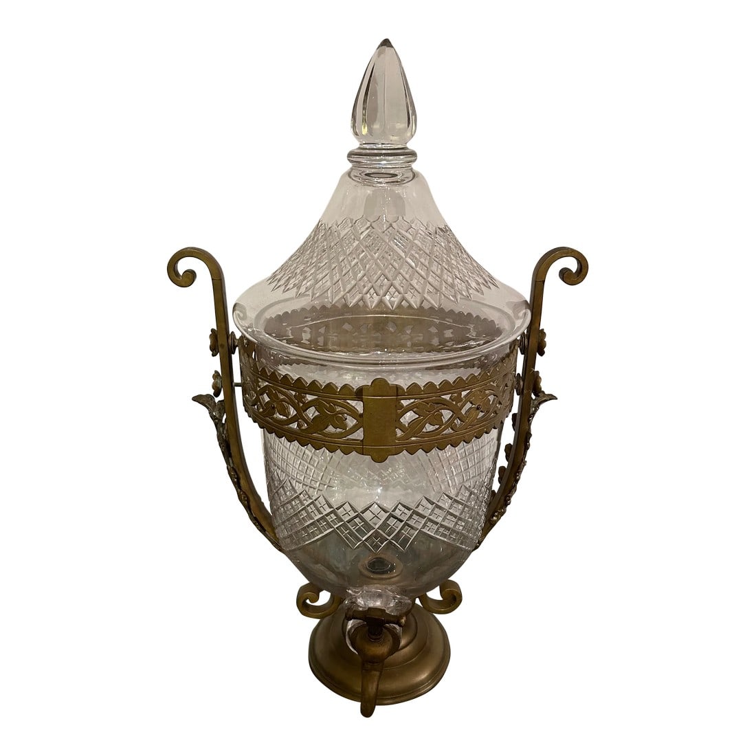Large Cut Crystal & Brass Samovar: Impressive in scale, large cut crystal samovar having lovely decorative brass holder with curlicues on the sides, round base and spigot. The samovar has removable top with elongated finial. Condition: