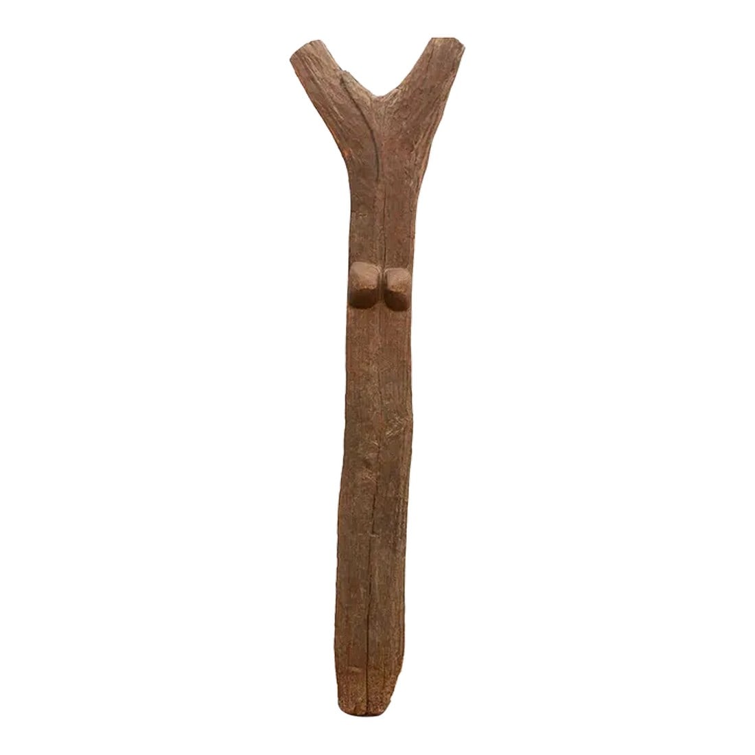 Rare Symbolic African Dogon House Post: This Dogon house post, with its distinctive forked top and evocative carvings, speaks volumes about the Dogon people's deep connection to their environment and spiritual beliefs. Hand-hewn from a sing
