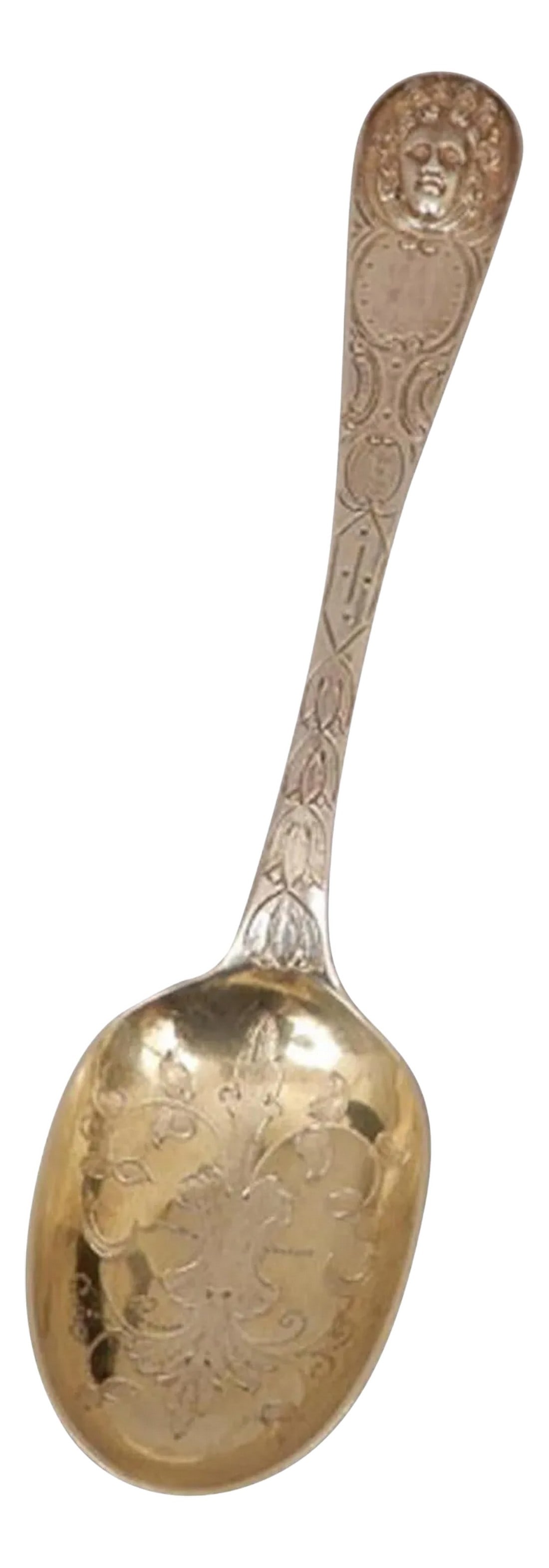 Period Louis XVI Sterling Table Spoon, Paris, 1789: Period Louis XVI sterling table spoon, Paris, 1789 A tour de force of the Louis XVI style with applied medallion handle. The oval flat edge gold-washed bowl is engraved with leaf and vine decoration.