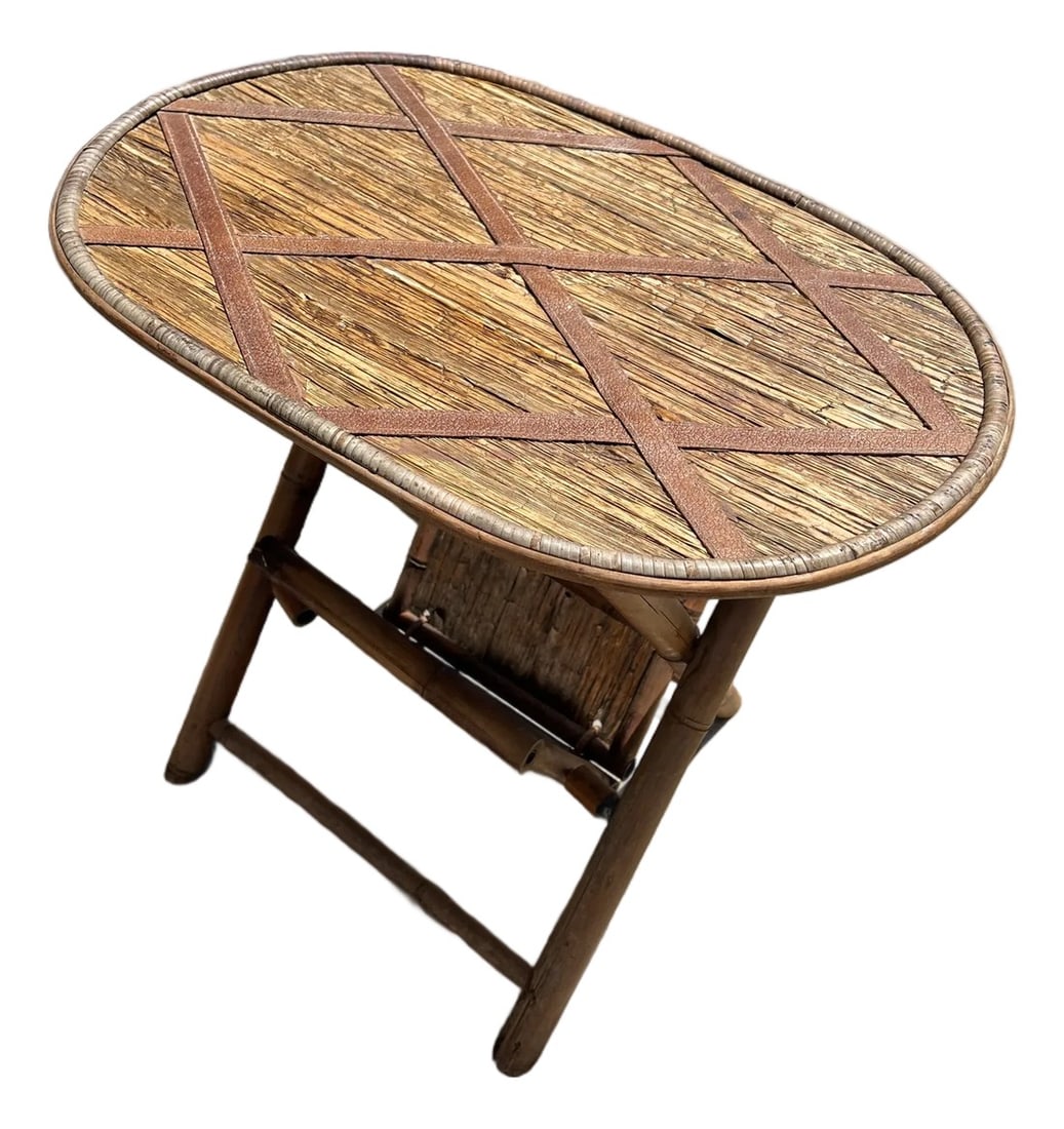 1970s Small Oval Wicker and Wooden Fold Up Side Table: Up for consideration is a beautiful vintage small wooden and wicker oval fold up side table. This piece is great way to add a cozy feeling to your home while having boho style. This is also a perfect 