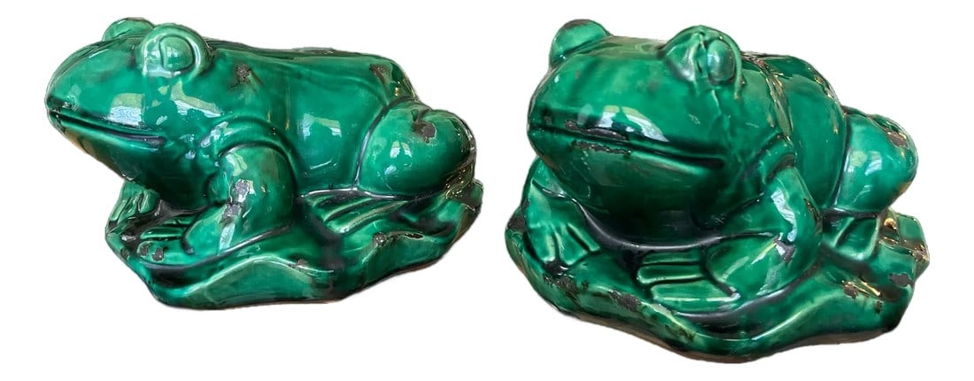 Vintage Glazed Green Ceramic Frogs on Lily Pad Bases Figural Statues - A Pair: A delightful pair of large vintage green ceramic frogs. Hand-crafted in glazed ceramic, each frog perches playfully atop a lily pad base, their rotund forms doubling as lidded jars. The vibrant green
