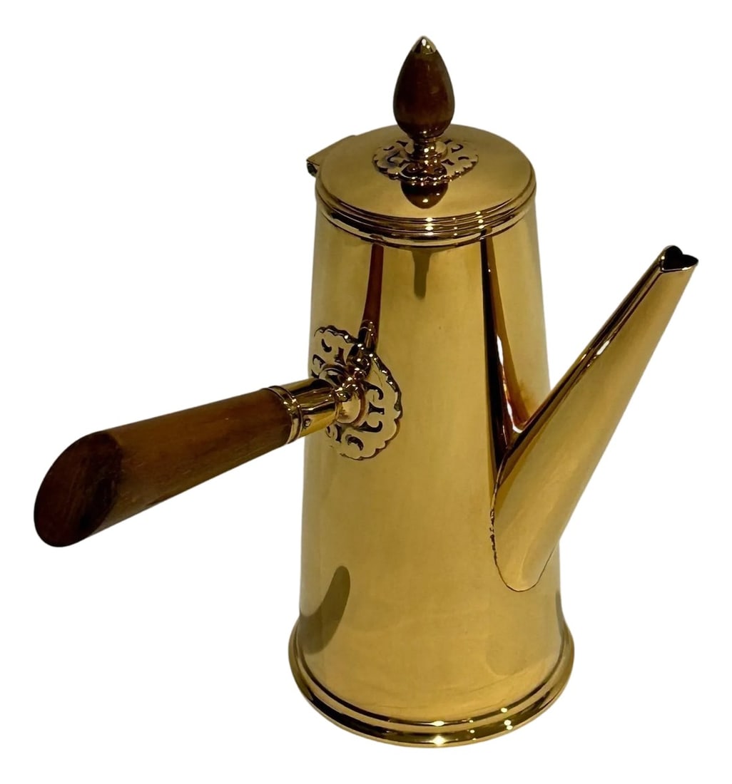 Mid 20th Century Tiffany & Co. Gilt Sterling Silver Chocolate Pot: Unusual and fine quality Vermeil Tiffany & Co. sterling silver chocolate pot with turned wood handle and finial set into decorative appliqué. Cut-cardwork roundels below lid finial and at handle 