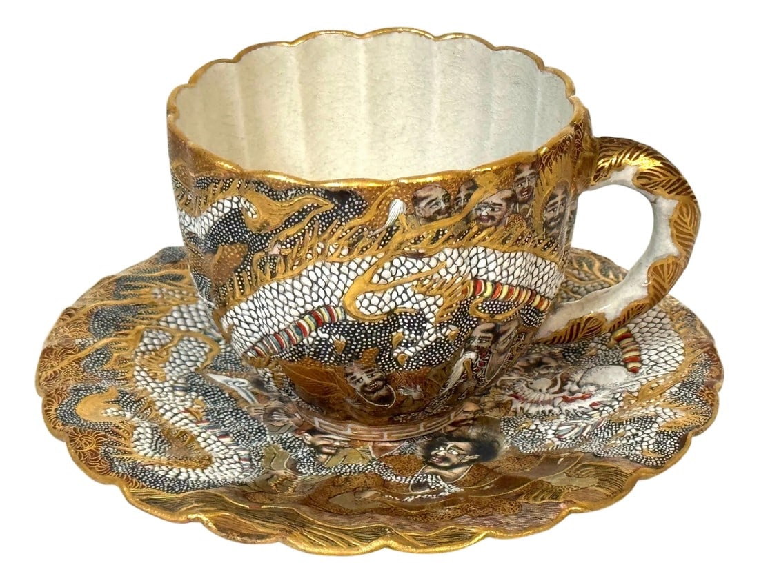 Meiji Satsuma Dragons & Immortals Cup & Saucer by Kitagawa-zÅ, Signed Dai Nippon: Meiji Satsuma Cup and Saucer by Kitagawa-zÅ with Dragons and Immortals, Signed Dai Nippon An extraordinary Meiji-period Satsuma porcelain cup and saucer, attributed to the distinguished Japanese 
