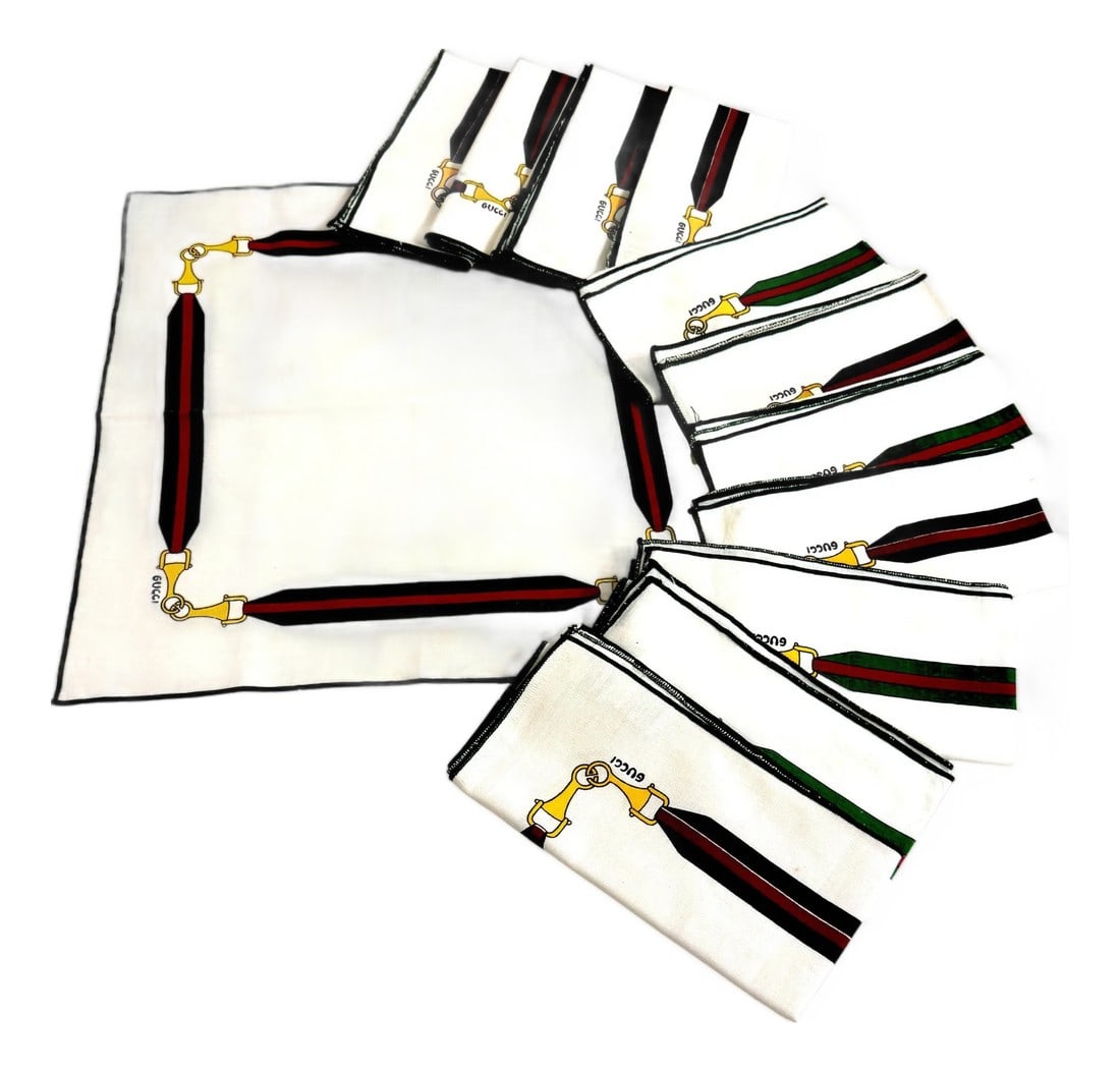 12 Vintage Aldo Gucci Equestrian Napkins with Horsebit Motif, Signed, 1980s: Set of Twelve Vintage Gucci Equestrian Napkins with Horsebit Motif, Signed, with Original Storage Bag and Authenticity Card Italy, circa 1970s–1980s Dimensions: Each napkin measures 16" square.