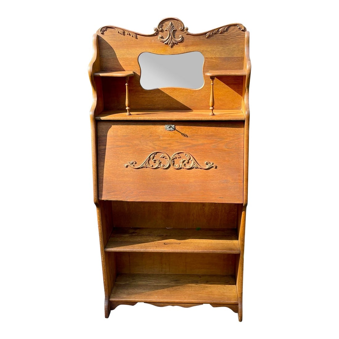 Antique Larkin Drop Front Secretary Desk: Offered is a golden oak drop front Larkin secretary desk given away by the Larkin Soap Co. as a premium at the turn of the century. It's in good condition with original labels and all its wooden embel