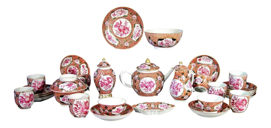 18th Century Chinese Export Coral & Puce Porcelain Tea Service: Coral Radiance: Chinese Export Fish-Scale Tea Service Object: Large Tea and Coffee Service (Partial) Origin: Jingdezhen, China (decorated for the European market) Date: Circa 1750-1765 (Qianlong