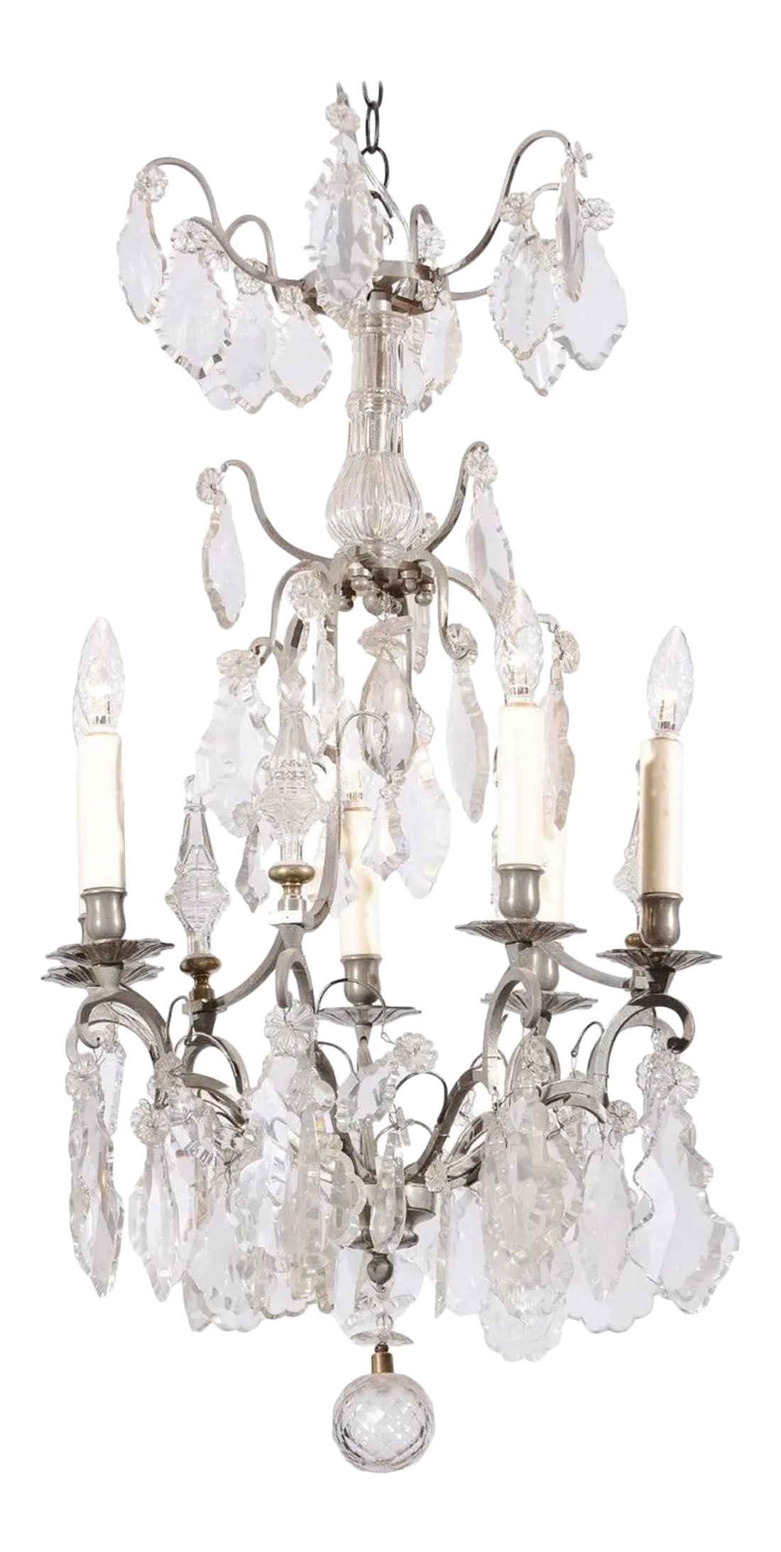 19th Century French Six-Light Crystal Chandelier with Silvered Iron Armature: A French six-light crystal chandelier from the 19th century, with silvered iron armature. Born in France during the 19th century, this exquisite chandelier presents a tiered Silhouette made of