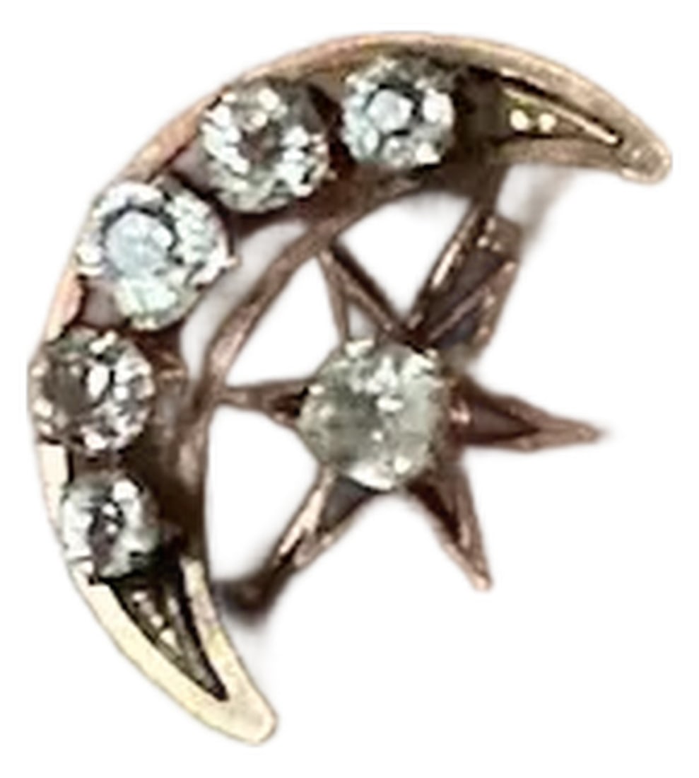late 19th Century Victorian Celestial Moon & Star Pin/Pendant: A highly sought after Victorian Celestial Pin that can also be worn as a pendant. This pin is 9k rose gold with paste stones. It looks new, and never worn, and features a moon and star motif, with a