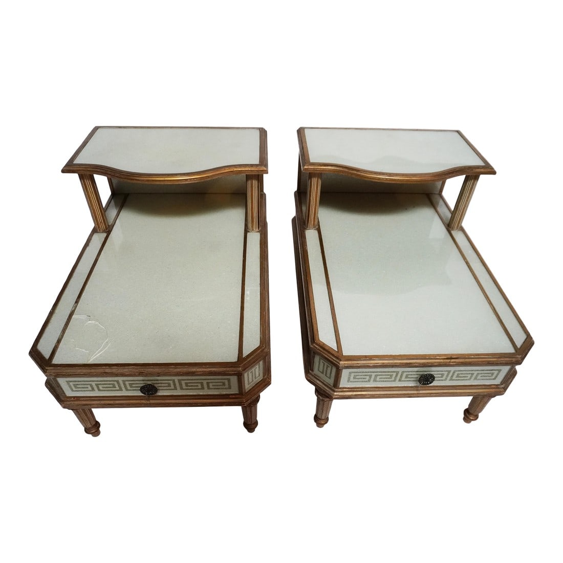 Mid 20th Century A Pair of Reverse-Painted and Opalescent Nightstands: Two-tier nightstands / side tables with fleck opalescent material under the surface and a reverse-painted key design. The two-tier design allows for extra surface area, plus a drawer for additional