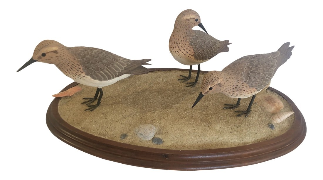 Nantucket Oval Tabletop Sculpture of Carved Wood Sandpipers on the Beach: Beautiful hand artisan made sculpture of 3 life like sandpipers on oval wooden platform having sand and shells. Perfect for a stylish beach house, or a reminder of summer days in any house. Signed on