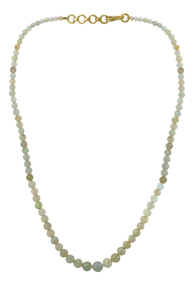 Natural Opal Faceted Bead Single Strand Necklace on Clearance Silver Clasp: Natural Opal single strand Bead Necklace In silver 18" long 1 layers of Natural opal Beads These are faceted beads so has lots of shine and glare Beautiful color Have lots of pieces Can sell in whole