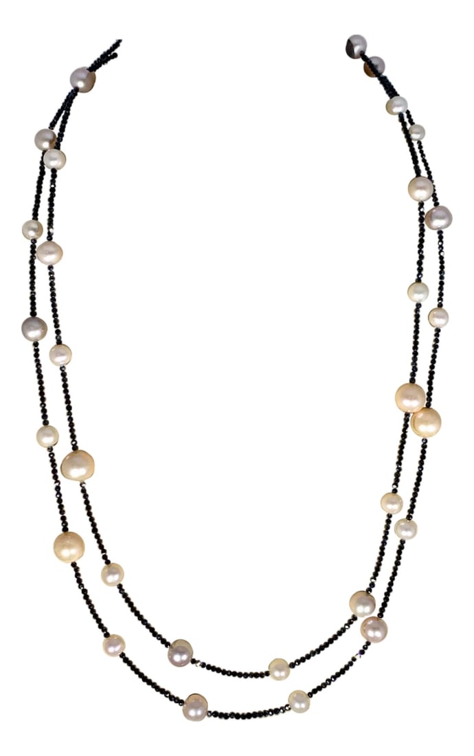 Fresh Water Pearl Single Strand Necklace with Black Spinel Opera Length 46 Inch: Fresh Water Pearl Single Strand Necklace 46" Long With Black Spinel This marvelous Fresh Water Pearl necklace features 35 pieces of 7, 8 , 10 MM of luscious Natural Fresh Water pearls spaced out by