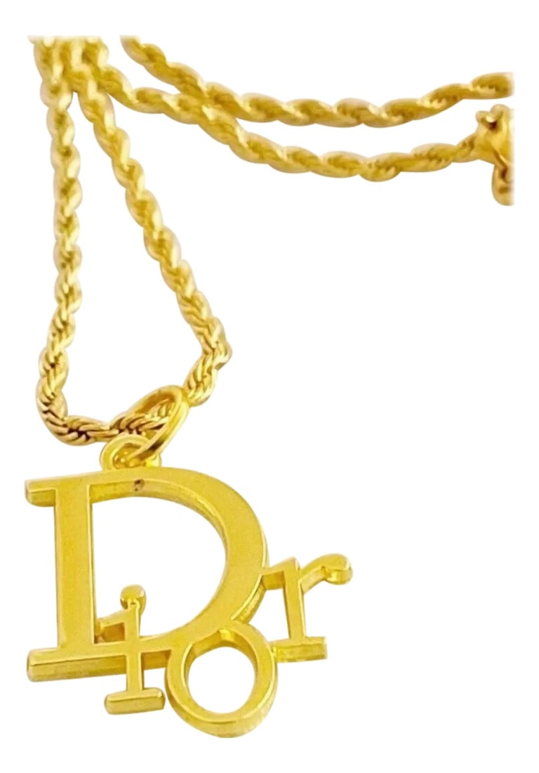 Authentic Christian DIOR Repurposed Charm Pendant Necklace Logo Gold: Authentic Christian DIOR Repurposed Charm Pendant Necklace Logo Gold Add a touch of luxury to your outfit with this Authentic Christian DIOR Repurposed Charm Pendant Necklace. Crafted from 18K yellow