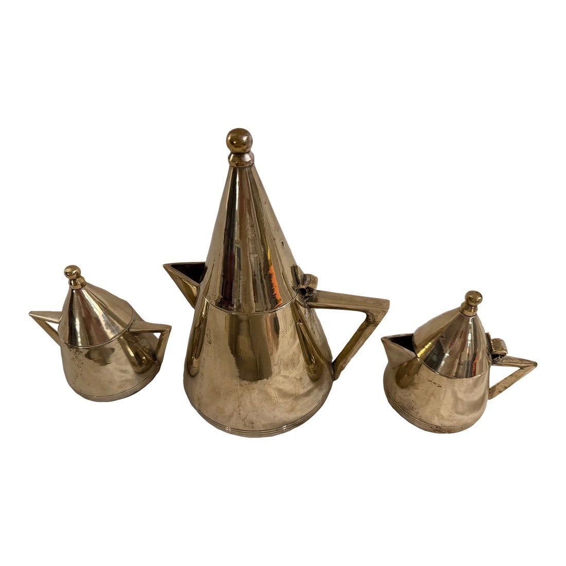 Mid 20th Century Art Deco Silver-Tone Metal Tea Set – Teapot, Sugar Pot & Milk Pot, 3-Piece: Art Deco silver-tone metal tea set comprising a teapot, sugar pot, and milk pot. The set features streamlined forms and balanced proportions characteristic of the Art Deco style. Style: Art Deco Desig