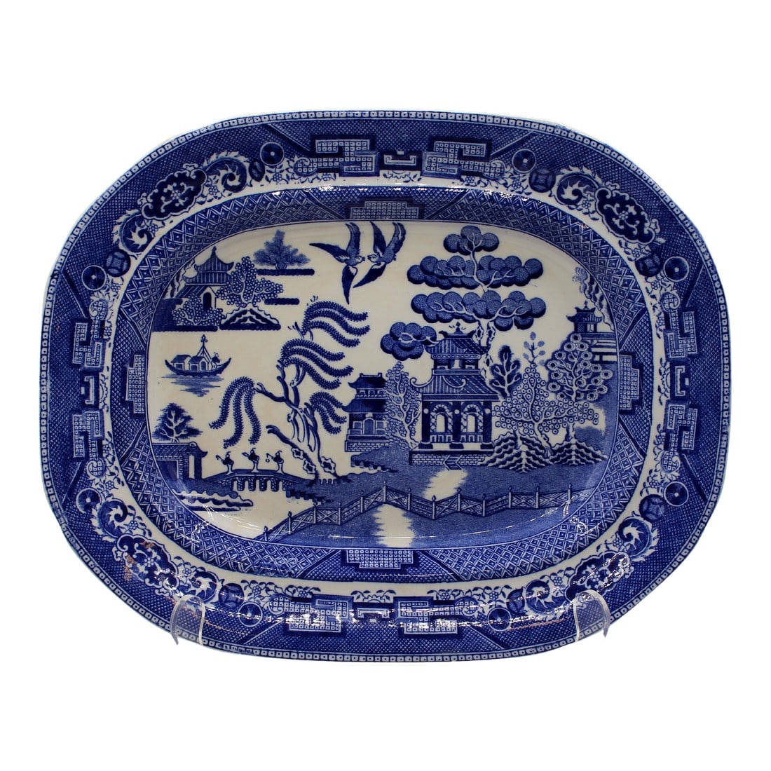 English C. 1900-1910 Wedgwood Blue Willow Pattern Platter: Circa 1900-1910 Wedgwood Blue Willow pattern platter, England. Deep blue color and precisely applied transfer. Blue backstamp: Wedgwood & Co, Ltd, England below a crown. 13" x 10.13" x 1.5"