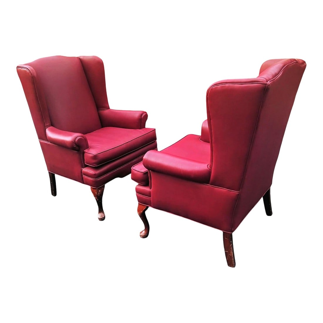 1970s Pair of Exquisite Oxblood High-Quality Mid-Century Modern Masterpiece Matching Wingback Chairs: Pair of Exquisite Oxblood high-quality Mid-Century Modern Masterpiece Matching Wingback Chairs A Pair of Classic Red Leather Wingback Chairs Elevate any living space with this exquisite pair of