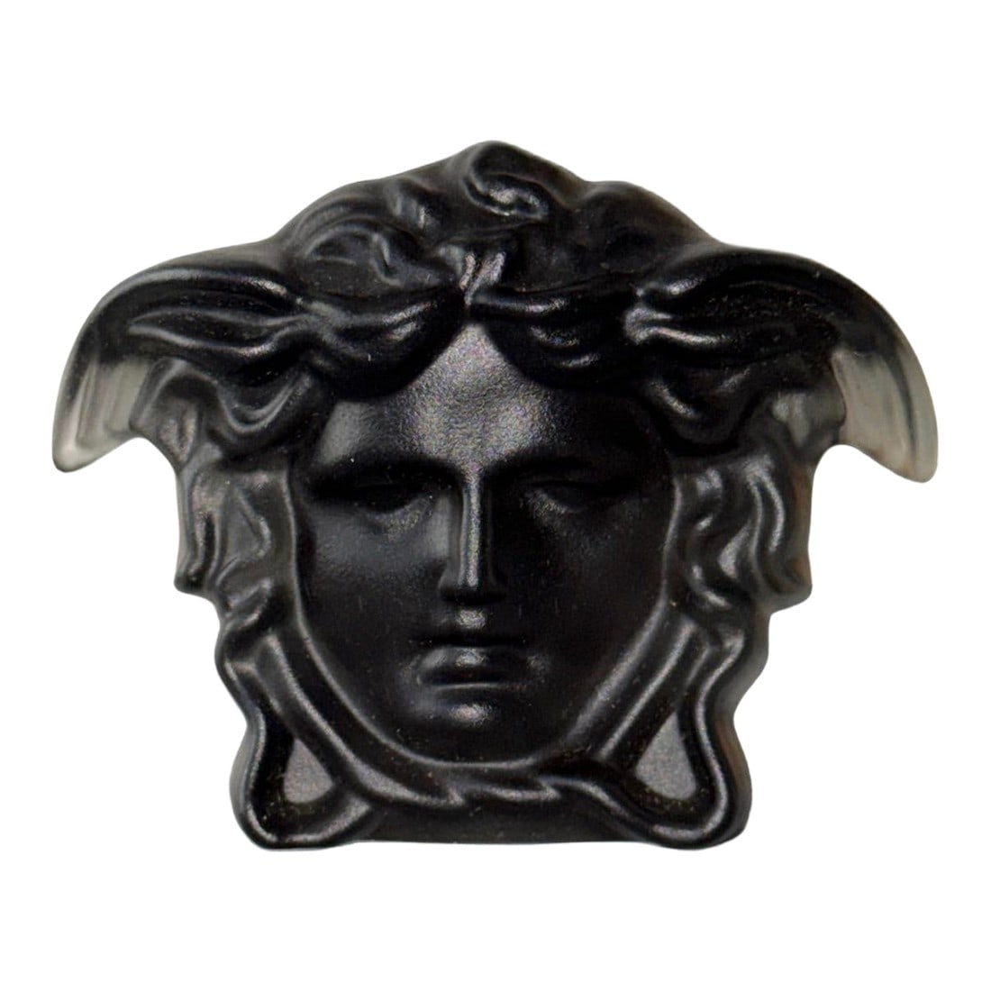 Versace Head of Medusa Black Matte Frosted Crystal Paperweight by Rosenthal of Germany: Medusa head paperweight designed by Versace, produced by Rosenthal. Two great luxury brands, Rosenthal porcelain company of Germany (founded in the late 19th Century) and the House of Versace (1978),